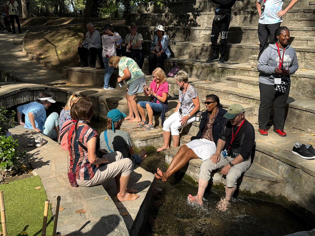 The tour group at the river by Lydia's baptism site in Philippi